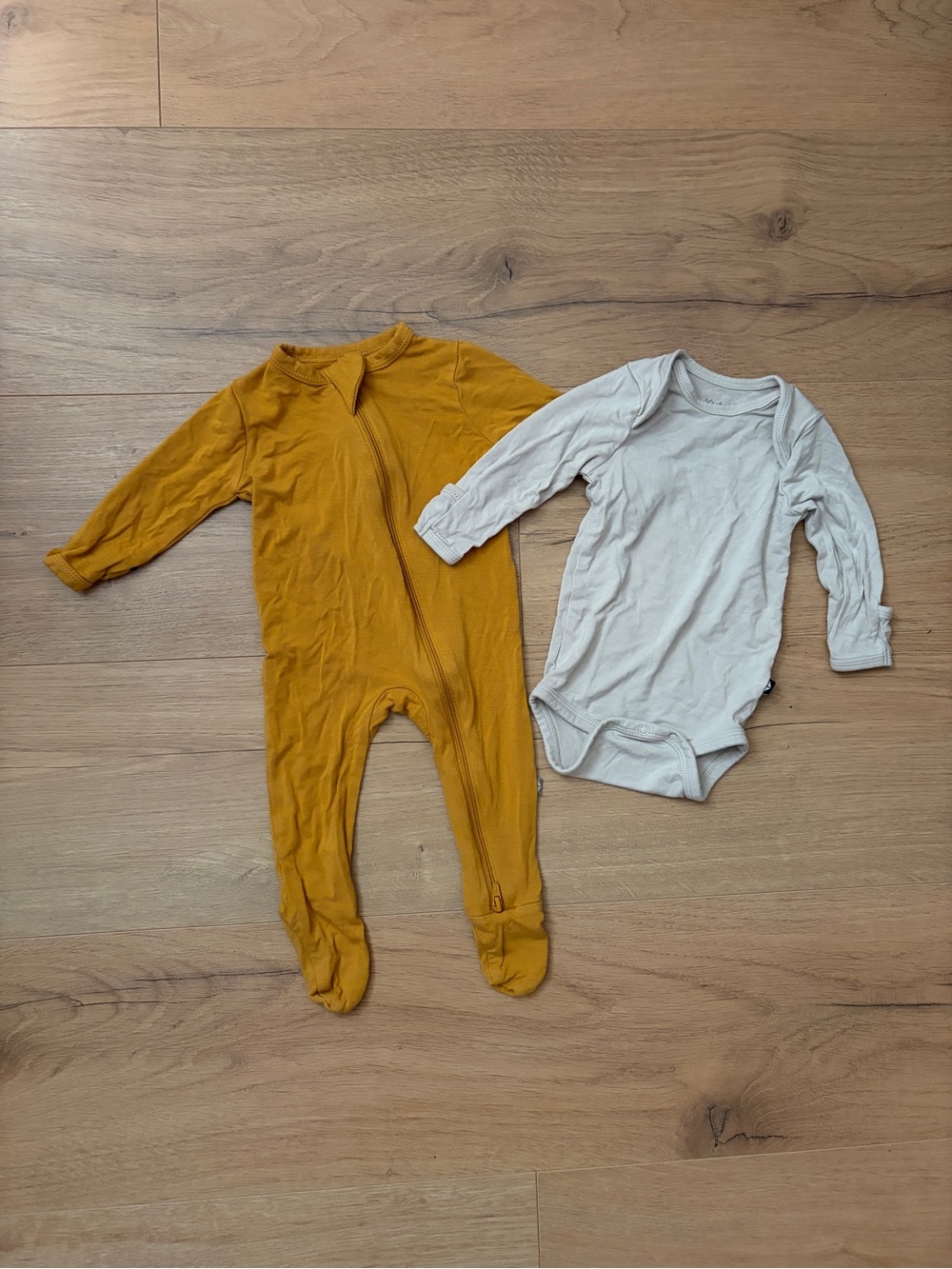Set of Kyte zippered footie sleeper and bodysuit
